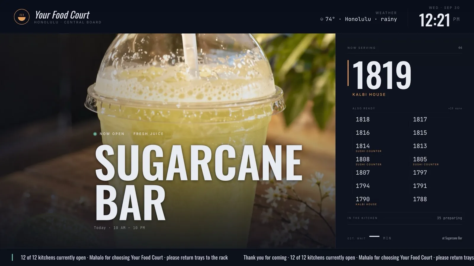 Sample food court central board on Musubi Display Network — order numbers and featured kitchen